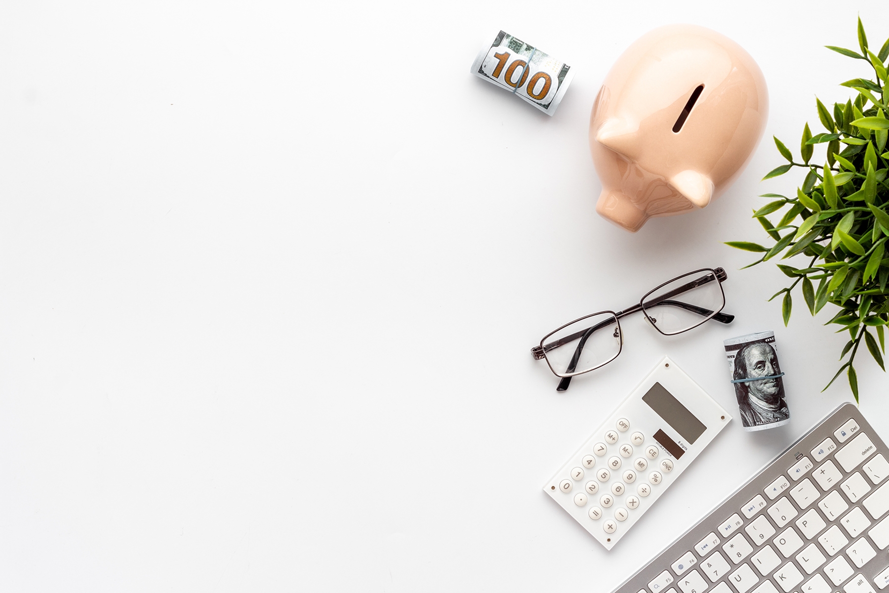 piggy bank, money and desk office supplies